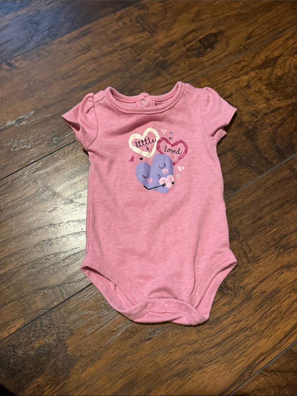 Pink little and loved hearts onesie